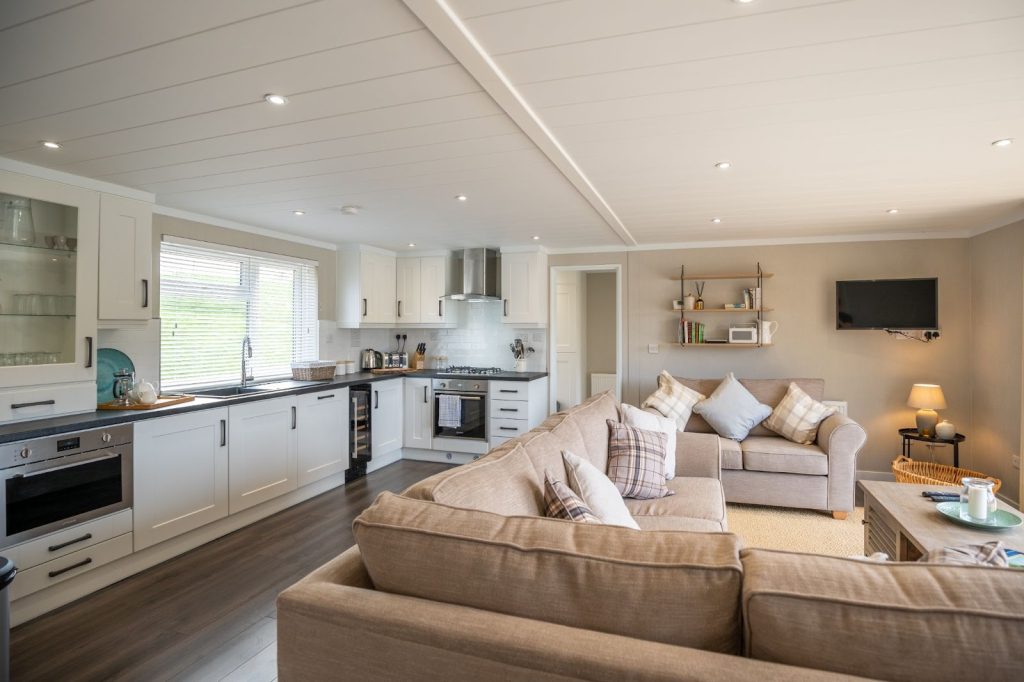 Lakeside Fishing Holidays | Kitchen & Living room at Lily lodge at Sumners Ponds