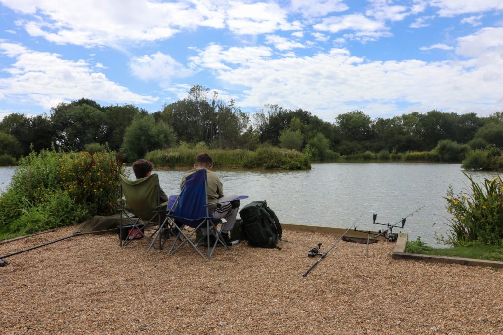 Lakeside Fishing Holidays | 2 boys fishing on Betty's Lake